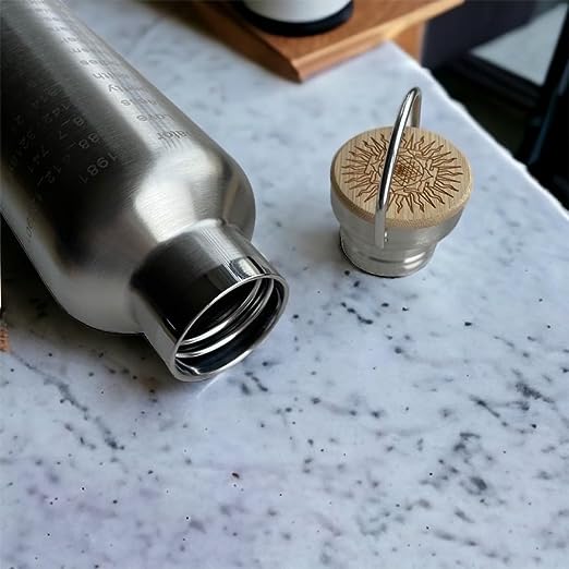1L silver stainless steel Grabovoi bottle with engraved energy codes to transform water and support vibrational healing.